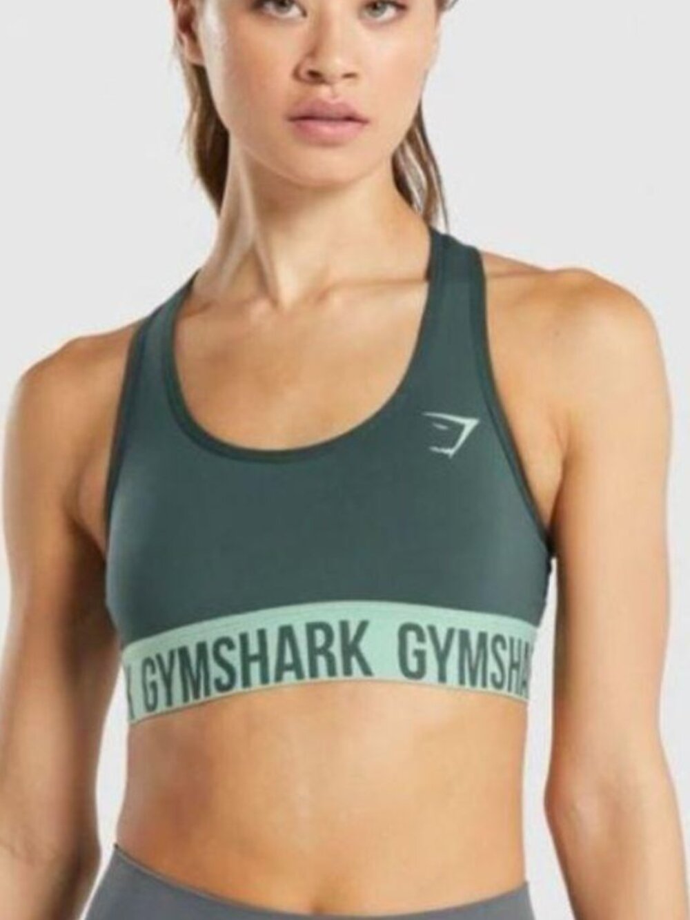 Gymshark Fit Seamless Sports Bra is featured in a dark green